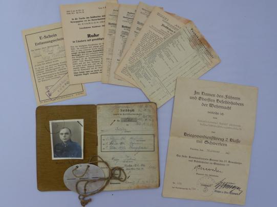 Soldbuch, dogtag and paperwork Inf. Ers. Rgt. 24