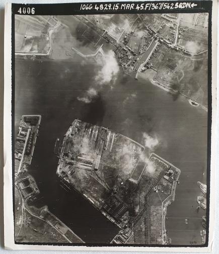 Aerial photo Schiedam (Rotterdam harbor) 15 March 1945